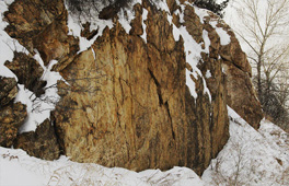 golden rock face & snow